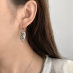 Zarte handwerkliche Ohrring