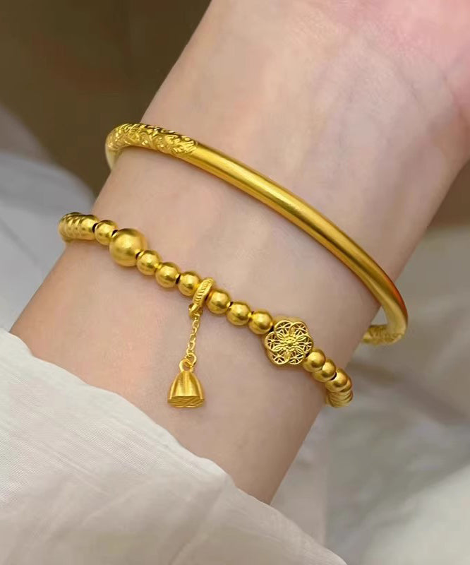 Gold Ancient Gold Bangle and Charm Bracelet Two Piece Set